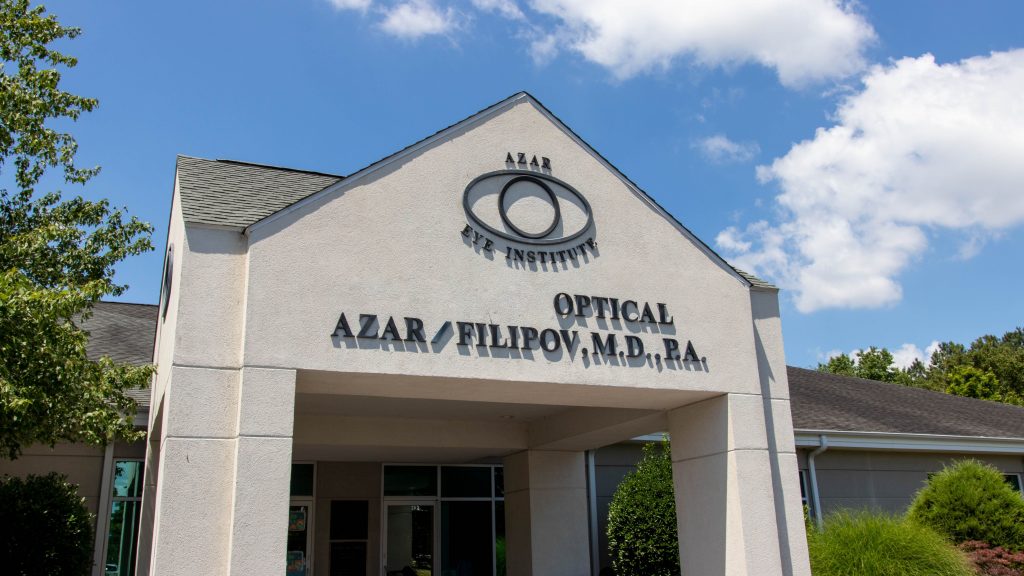 Tan building with the Azar Eye Institute logo on it in Salisbury