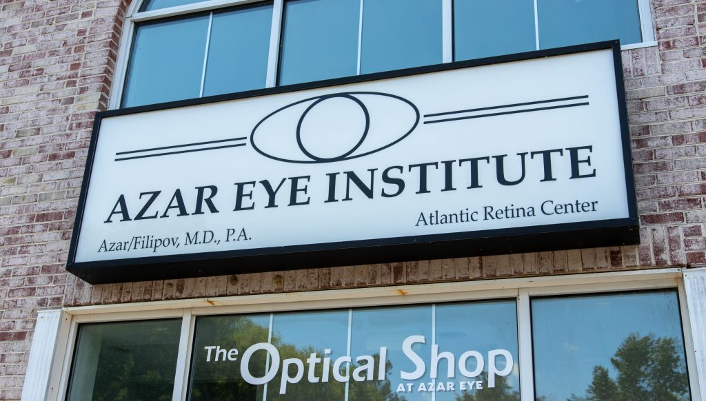 Azar Eye Institute sign on a brick building in Berlin